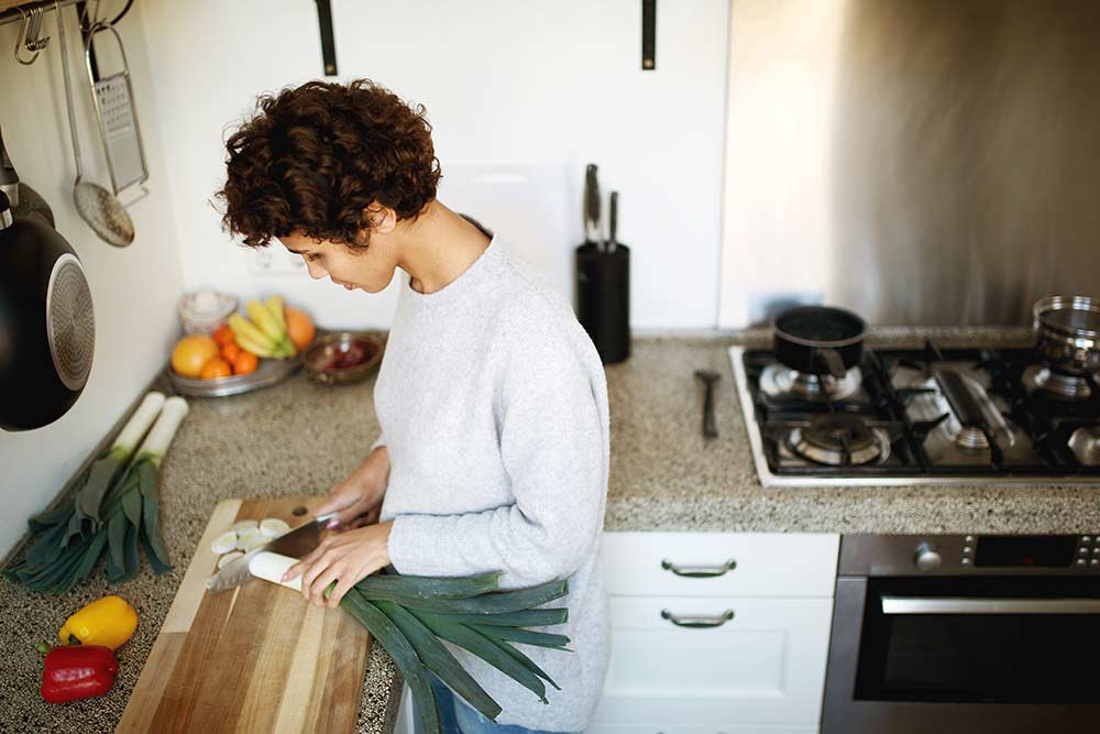 Can I cut on granite countertops or put hot pots on the surface?